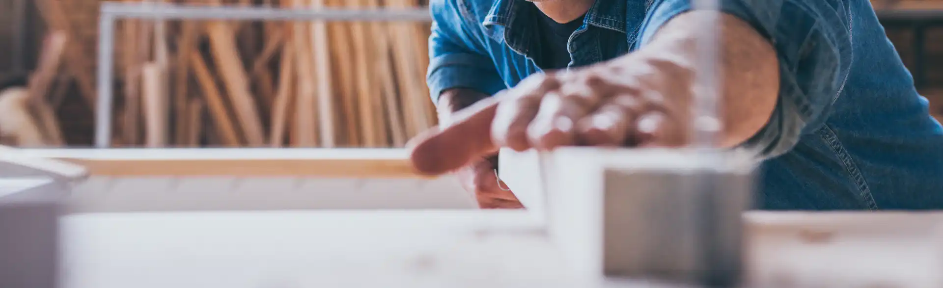 Carpenter smoothing plank of wood carpenter smoothing plank