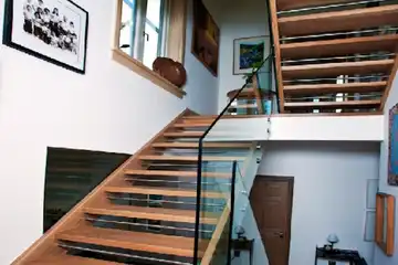 open riser closed string walnut stairs