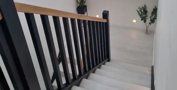 Oak Stairs closed riser closed string stairs with black railings